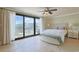 The bright main bedroom offers balcony access with sliding glass doors and views at 741 Retreat Beach Circle # B-1-F, Pawleys Island, SC 29585