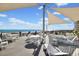 Charming outdoor seating area with ocean views, perfect for relaxing and enjoying the coastal scenery at 741 Retreat Beach Circle # B-1-F, Pawleys Island, SC 29585