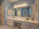 Spacious bathroom featuring a double vanity, a large mirror, and lots of light at 800 Castleford Circle # 1-E, Myrtle Beach, SC 29572