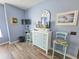 Bedroom featuring a vintage dresser, stools and a flat-screen TV at 800 Castleford Circle # 1-E, Myrtle Beach, SC 29572