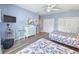 Spacious bedroom featuring two beds, closet, and a flat-screen TV at 800 Castleford Circle # 1-E, Myrtle Beach, SC 29572