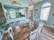 Dining room with large table and seating and a view into the kitchen at 800 Castleford Circle # 1-E, Myrtle Beach, SC 29572