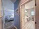 Hallway with views of the bedroom and bathroom featuring tile floors at 800 Castleford Circle # 1-E, Myrtle Beach, SC 29572