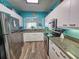 Modern kitchen with stainless steel appliances, granite countertops, and wood floors at 800 Castleford Circle # 1-E, Myrtle Beach, SC 29572
