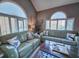 Comfortable living room features vaulted ceiling, wood floors and nautical accents at 800 Castleford Circle # 1-E, Myrtle Beach, SC 29572