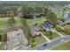 Panoramic aerial view of the home next to a golf course and pond, plus a nearby construction site at 9278 Nw Checkerberry Square, Calabash, NC 28467