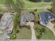 Bird's eye view of the property, highlighting the meticulously maintained landscaping and proximity to the golf course at 9278 Nw Checkerberry Square, Calabash, NC 28467