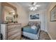 Comfortable bedroom with a decorated dresser, a mirror, and tranquil decor at 9400 Shore Dr. # 506, Myrtle Beach, SC 29572