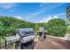 Outdoor grilling area featuring two well-maintained grills, set against a backdrop of lush green hedges at 9400 Shore Dr. # 506, Myrtle Beach, SC 29572