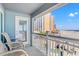 Balcony view overlooking the ocean, beach and city buildings in the background at 9540 Shore Dr. # 3-H, Myrtle Beach, SC 29572