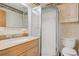 Bathroom featuring vanity with granite countertop and glass enclosed shower at 9540 Shore Dr. # 3-H, Myrtle Beach, SC 29572