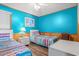 Bright bedroom featuring two twin beds and coastal decor at 9540 Shore Dr. # 3-H, Myrtle Beach, SC 29572
