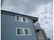 Charming blue condo with a private balcony, multiple windows, and beach views at 9540 Shore Dr. # 3-H, Myrtle Beach, SC 29572