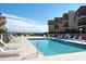 Inviting outdoor pool with lounge chairs and beach access in a beautifully landscaped community at 9540 Shore Dr. # 3-H, Myrtle Beach, SC 29572