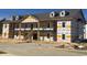 New construction showing modern condo building with stairs, windows and doors at 1411 Gooseneck Place # 202 Middle, Murrells Inlet, SC 29576