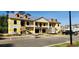 Exterior view of a condo building under construction with wooden staircases, and a trailer on the parking lot at 1411 Gooseneck Place # 202 Middle, Murrells Inlet, SC 29576