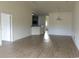Bright and airy living room features modern lighting at 1411 Gooseneck Place # 202 Middle, Murrells Inlet, SC 29576