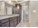 Bathroom with granite countertop vanity and glass enclosed walk-in shower at 152 Creek Harbour Circle, Murrells Inlet, SC 29576