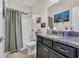 Bathroom with granite countertop vanity and shower with curtain at 152 Creek Harbour Circle, Murrells Inlet, SC 29576