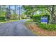 Creek Harbour community sign at boat dock and boat ramp amidst wooded surroundings at 152 Creek Harbour Circle, Murrells Inlet, SC 29576