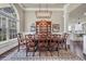 Formal dining room with hardwood floors, a large window and a china cabinet at 152 Creek Harbour Circle, Murrells Inlet, SC 29576