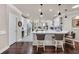 Bright kitchen with white cabinets, stainless steel appliances and a wine fridge at 152 Creek Harbour Circle, Murrells Inlet, SC 29576
