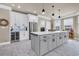 Bright kitchen with white cabinets, stainless steel appliances, and a gray kitchen island at 152 Creek Harbour Circle, Murrells Inlet, SC 29576