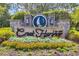 Community entrance sign for Creek Harbour featuring brick pillars, decorative lighting and flower beds at 152 Creek Harbour Circle, Murrells Inlet, SC 29576