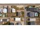 Real estate showcasing residential properties with private pools and well-manicured lawns at 202 56Th Ave. N, North Myrtle Beach, SC 29582