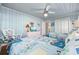 Bedroom with two beds, hardwood floors, ceiling fan and closet at 202 56Th Ave. N, North Myrtle Beach, SC 29582