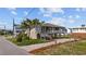 Charming two-story home with an elevated design, landscaped yard, and convenient parking at 202 56Th Ave. N, North Myrtle Beach, SC 29582
