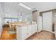 Kitchen with tile floor, a white refrigerator, drawers, and access to the dining and living room at 202 56Th Ave. N, North Myrtle Beach, SC 29582