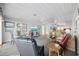 Spacious and airy open-plan living area with casual furnishings and decorative beach-themed accents at 202 56Th Ave. N, North Myrtle Beach, SC 29582
