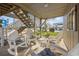 Outdoor area under the elevated home with seating, stairs, and shade from the sun at 202 56Th Ave. N, North Myrtle Beach, SC 29582