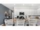 Bright kitchen featuring granite countertops, stainless steel appliances, and an island with barstool seating at 235 Warner Crossing Way, Loris, SC 29569