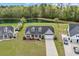 Aerial shot of house featuring manicured lawn and long driveway at 270 Moulton Dr., Longs, SC 29568