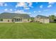 Lush backyard with expansive lawn area and additional storage shed at 270 Moulton Dr., Longs, SC 29568