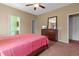Bedroom with wooden furniture, including a dresser, and a ceiling fan at 270 Moulton Dr., Longs, SC 29568