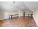 Bonus room with tiled flooring and large windows, offering ample space for flexible use and customization at 270 Moulton Dr., Longs, SC 29568