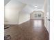 Spacious bonus room with large windows, neutral paint, and tiled flooring, perfect for versatile living at 270 Moulton Dr., Longs, SC 29568