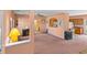 Spacious living room showcasing a kitchen pass-through, ceiling fan, and natural light at 270 Moulton Dr., Longs, SC 29568