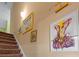 Carpeted stairway with decorative wall art enhancing the home's interior design at 270 Moulton Dr., Longs, SC 29568