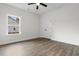 Bedroom featuring wood-look floors, a ceiling fan, and a double door closet at 334 William Nobles Rd., Aynor, SC 29511