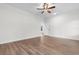A spacious bedroom featuring a ceiling fan and wood-look flooring for a modern touch at 334 William Nobles Rd., Aynor, SC 29511