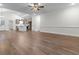 Open-concept living area with kitchen, dining, and living spaces and vaulted ceiling at 334 William Nobles Rd., Aynor, SC 29511