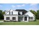 Charming two-story home with a brick facade, white siding, black shutters and manicured lawn at 346 Ridge Rd., Galivants Ferry, SC 29544