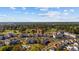 Aerial view of the community showcasing the proximity to the golf course and wooded areas at 4771 Wild Iris Dr. # 204, Myrtle Beach, SC 29577