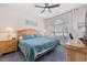 Bright bedroom with a large window and comfortable bed at 4771 Wild Iris Dr. # 204, Myrtle Beach, SC 29577