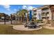 Exterior view of the common area near the pool and community amenities with outdoor seating at 4771 Wild Iris Dr. # 204, Myrtle Beach, SC 29577