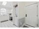 Kitchenette with tile flooring, modern appliances, and ample storage at 4771 Wild Iris Dr. # 204, Myrtle Beach, SC 29577